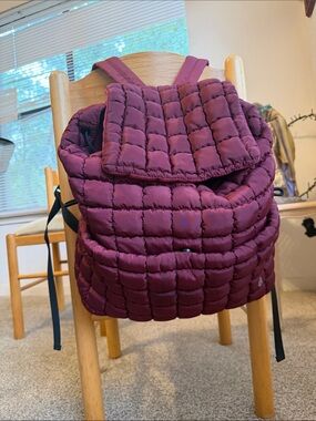Free People Quilted Puffer Backpack in Deep Plum